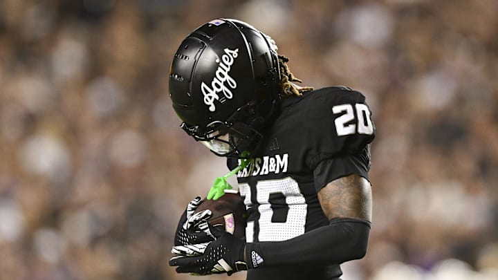 Oct 26, 2024; College Station, Texas, USA; Texas A&M Aggies defensive back BJ Mayes (20) reacts after intercepting a pass against the LSU Tigers during the fourth quarter. The Aggies defeated the Tigers 38-23; at Kyle Field. Mandatory Credit: Maria Lysaker-Imagn Images.  