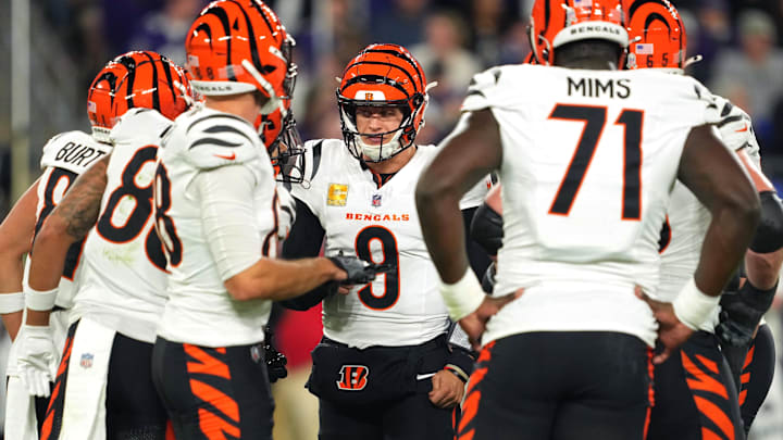 Nov 7, 2024; Baltimore, Maryland, USA; Cincinnati Bengals quarterback Joe Burrow (9) in the huddle against the Baltimore Ravens during the first quarter at M&T Bank Stadium. Mandatory Credit: Mitch Stringer-Imagn Images