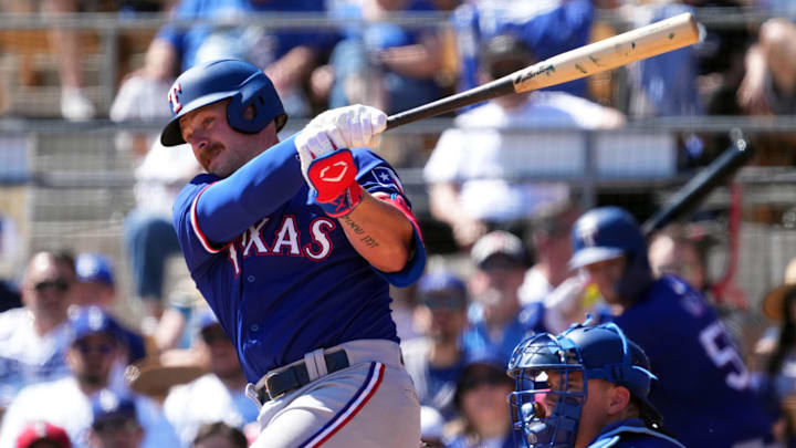 Mar 9, 2024; Phoenix, Arizona, USA; Texas Rangers first baseman Blaine Crim (74) bats against the Los Angeles Dodgers during the second inning at Camelback Ranch-Glendale. Mar 9, 2024; Phoenix, Arizona, USA; Texas Rangers first baseman Blaine Crim (74) bats against the Los Angeles Dodgers during the second inning at Camelback Ranch-Glendale.