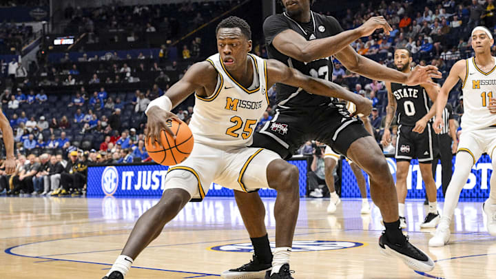 Mar 13, 2025; Nashville, TN, USA; Missouri Tigers guard Mark Mitchell (25) dribbles the ball against the Mississippi State Bulldogs during the first half at Bridgestone Arena. Mandatory Credit: Steve Roberts-Imagn Images Mar 13, 2025; Nashville, TN, USA; Missouri Tigers guard Mark Mitchell (25) dribbles the ball against the Mississippi State Bulldogs during the first half at Bridgestone Arena. Mandatory Credit: Steve Roberts-Imagn Images
