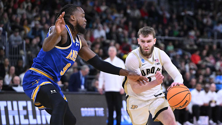 Purdue guard Braden Smith (3) drives against McNeese's Bryant Selebangue during the second round of the NCAA Tournament. Purdue guard Braden Smith (3) drives against McNeese's Bryant Selebangue during the second round of the NCAA Tournament.