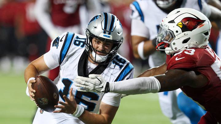 Aug 6, 2026; Canton, Ohio, USA; Carolina Panthers quarterback Haynes King (16) runs the ball against Arizona Cardinals linebacker Austin Keys (53) at Tom Benson Hall of Fame Stadium. Mandatory Credit: Charles LeClaire-Imagn Images Aug 6, 2026; Canton, Ohio, USA; Carolina Panthers quarterback Haynes King (16) runs the ball against Arizona Cardinals linebacker Austin Keys (53) at Tom Benson Hall of Fame Stadium. Mandatory Credit: Charles LeClaire-Imagn Images