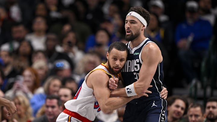 Feb 12, 2025; Dallas, Texas, USA; Golden State Warriors guard Stephen Curry (30) and Dallas Mavericks guard Klay Thompson (31) in action during the game between the Dallas Mavericks and the Golden State Warriors at the American Airlines Center. Mandatory Credit: Jerome Miron-Imagn Images