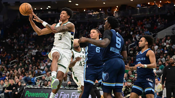 Oct 20, 2023; Milwaukee, Wisconsin, USA; Milwaukee Bucks center MarJon Beauchamp (3) gets a pass away from Memphis Grizzlies forward Kenneth Lofton Jr. (6) and center Vince Williams Jr. (5) in the fourth quarter at Fiserv Forum. Mandatory Credit: Benny Sieu-Imagn Images Oct 20, 2023; Milwaukee, Wisconsin, USA; Milwaukee Bucks center MarJon Beauchamp (3) gets a pass away from Memphis Grizzlies forward Kenneth Lofton Jr. (6) and center Vince Williams Jr. (5) in the fourth quarter at Fiserv Forum. Mandatory Credit: Benny Sieu-Imagn Images