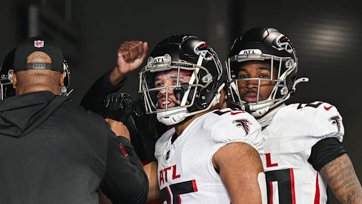 Dec 8, 2024; Minneapolis, Minnesota, USA; Atlanta Falcons running back Avery Williams (26) and cornerback Dee Alford (20) prepare to enter the field before the game against the Minnesota Vikings at U.S. Bank Stadium. Mandatory Credit: Jeffrey Becker-Imagn Images