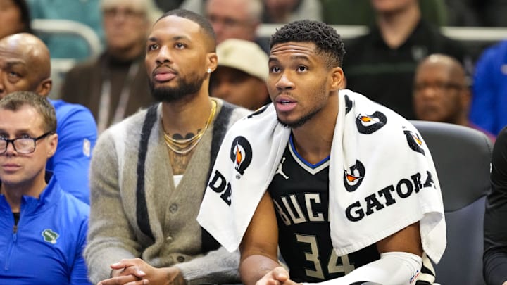 Nov 12, 2024; Milwaukee, Wisconsin, USA; Milwaukee Bucks forward Giannis Antetokounmpo (34) sits with guard Damian Lillard on the bench during the fourth quarter against the Toronto Raptors at Fiserv Forum. Mandatory Credit: Jeff Hanisch-Imagn Images Nov 12, 2024; Milwaukee, Wisconsin, USA; Milwaukee Bucks forward Giannis Antetokounmpo (34) sits with guard Damian Lillard on the bench during the fourth quarter against the Toronto Raptors at Fiserv Forum. Mandatory Credit: Jeff Hanisch-Imagn Images