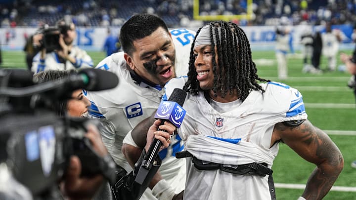 Detroit Lions offensive tackle Penei Sewell (58) interrupts as running back Jahmyr Gibbs (0) is being interviewed after 44-30 win over Dallas Cowboys at Ford Field in Detroit on Thursday, Dec. 4, 2025.