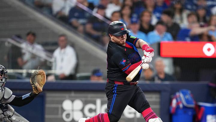 Jun 12, 2026; Toronto, Ontario, CAN; Toronto Blue Jays catcher Alejandro Kirk (30) hits an RBI single against the New York Yankees during the fifth inning at Rogers Centre. Mandatory Credit: Nick Turchiaro-Imagn Images