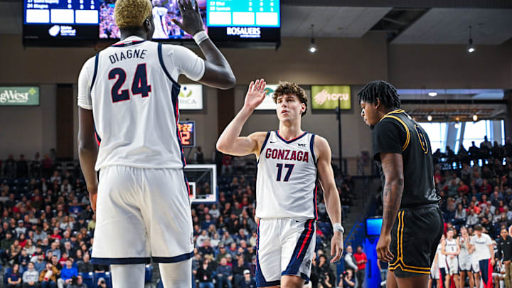 Gonzaga Bulldogs guard Mario Saint-Supery (17) and center Ismaila Diagne (24). Gonzaga Bulldogs guard Mario Saint-Supery (17) and center Ismaila Diagne (24).