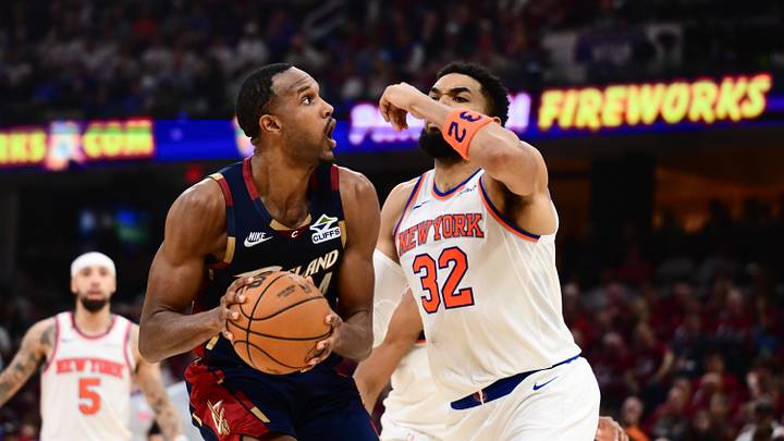 May 25, 2026; Cleveland, Ohio, USA; Cleveland Cavaliers forward Evan Mobley (4) looks to shoot while defended by New York Knicks center Karl-Anthony Towns (32) in the fourth quarter during game four of the eastern conference finals for the 2026 NBA playoffs at Rocket Arena. Mandatory Credit: Ken Blaze-Imagn Images May 25, 2026; Cleveland, Ohio, USA; Cleveland Cavaliers forward Evan Mobley (4) looks to shoot while defended by New York Knicks center Karl-Anthony Towns (32) in the fourth quarter during game four of the eastern conference finals for the 2026 NBA playoffs at Rocket Arena. Mandatory Credit: Ken Blaze-Imagn Images