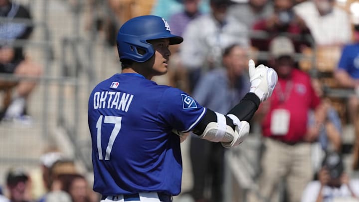 Mar 11, 2025; Phoenix, Arizona, USA; Los Angeles Dodgers player Shohei Ohtani (17) asks for a pitch challenge against the Cleveland Guardians in the first inning at Camelback Ranch-Glendale. Mandatory Credit: Rick Scuteri-Imagn Images