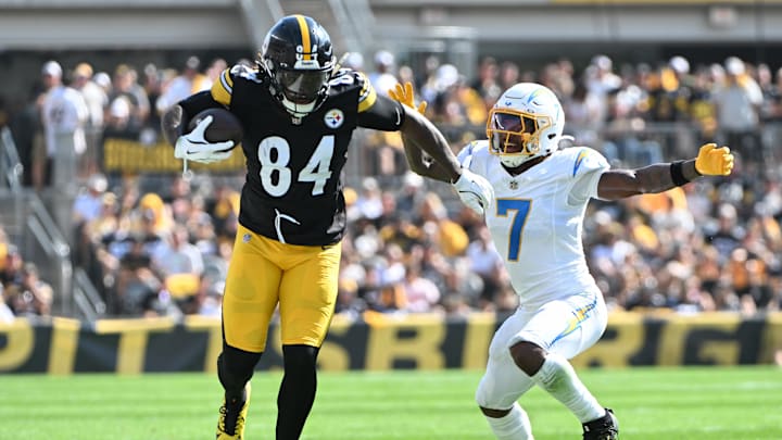 Sep 22, 2024; Pittsburgh, Pennsylvania, USA; Pittsburgh Steelers running back Cordarrelle Patterson (84) breaks away from Los Angeles Chargers cornerback Kristian Fulton (7) during the third quarter at Acrisure Stadium. Mandatory Credit: Barry Reeger-Imagn Images Sep 22, 2024; Pittsburgh, Pennsylvania, USA; Pittsburgh Steelers running back Cordarrelle Patterson (84) breaks away from Los Angeles Chargers cornerback Kristian Fulton (7) during the third quarter at Acrisure Stadium. Mandatory Credit: Barry Reeger-Imagn Images
