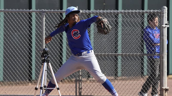 Feb 16, 2024; Mesa, AZ, USA; Chicago Cubs starting pitcher Michael Arias (82) throws in the bullpen during Spring Training camp at Sloan Park. Mandatory Credit: Rick Scuteri-Imagn Images