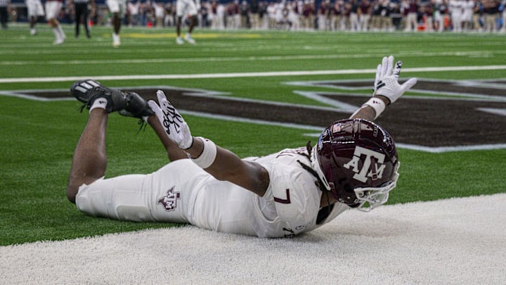 Sep 30, 2023; Arlington, Texas, USA; Texas A&M Aggies defensive back Tyreek Chappell (7) celebrates after he breaks up a pass intended for Arkansas Razorbacks wide receiver Andrew Armstrong during the second half at AT&T Stadium. Mandatory Credit: Jerome Miron-Imagn Images Sep 30, 2023; Arlington, Texas, USA; Texas A&M Aggies defensive back Tyreek Chappell (7) celebrates after he breaks up a pass intended for Arkansas Razorbacks wide receiver Andrew Armstrong during the second half at AT&T Stadium. Mandatory Credit: Jerome Miron-Imagn Images
