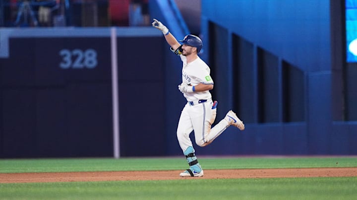 Toronto Blue Jays first baseman Spencer Horwitz (48) runs the bases and celebrates hitting a home run against the Oakland Athletics during the eighth inning at Rogers Centre. 