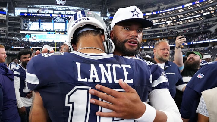 Dallas Cowboys quarterbacks Trey Lance (L) and Dak Prescott (R)