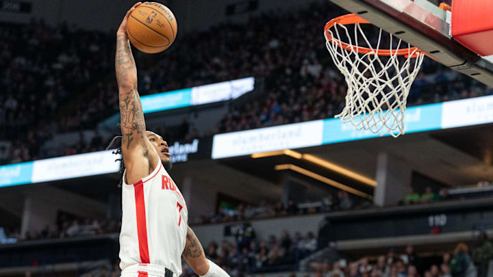 Apr 2, 2024; Minneapolis, Minnesota, USA; Houston Rockets forward Cam Whitmore (7) dunks against the Minnesota Timberwolves in the third quarter at Target Center. Mandatory Credit: Matt Blewett-Imagn Images