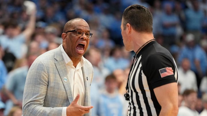 North Carolina head coach Hubert Davis argues with an official.