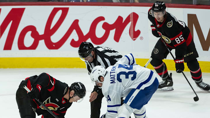 Jan 25, 2025; Ottawa, Ontario, CAN; Ottawa Senators left wing Brady Tkachuk (7) faces off against Toronto Maple Leafs center Auston Matthews (34) in the third period at the Canadian Tire Centre. Mandatory Credit: Marc DesRosiers-Imagn Images