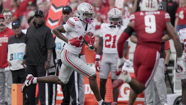 Oct 18, 2025; Madison, Wisconsin, USA; Ohio State wide receiver Quincy Porter (11) makes a reception during the third quarter of their game against Wisconsin at Camp Randall Stadium. Mandatory Credit: Mark Hoffman-USA TODAY Network via Imagn Images