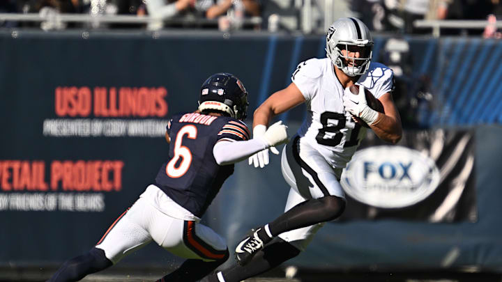 Oct 22, 2023; Chicago, Illinois, USA;  Las Vegas Raiders tight end Austin Hooper (81) runs upfield