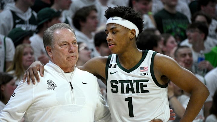 Michigan State Spartans head coach Tom Izzo huddles with Michigan State Spartans guard Jeremy Fears Jr. (1) during the second half against the Michigan Wolverines at Jack Breslin Student Events Center. 