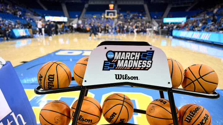 Feb 5, 2025; Los Angeles, California, USA; A rack of basketballs with the March Madness logo before that start of the UCLA Bruins - Ohio State Buckeyes game at Pauley Pavilion presented by Wescom. Mandatory Credit: Robert Hanashiro-Imagn Images