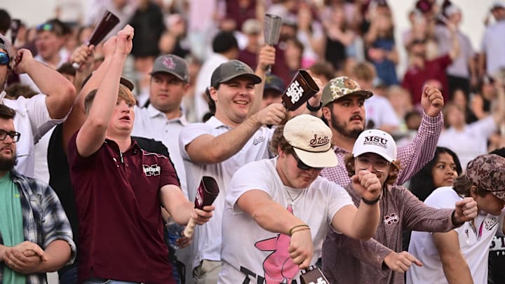 Oct 19, 2024; Starkville, Mississippi, USA; Mississippi State Bulldogs fans cheer during the fourth quarter against the Texas A&M Aggies at Davis Wade Stadium at Scott Field. Mandatory Credit: Matt Bush-Imagn Images
