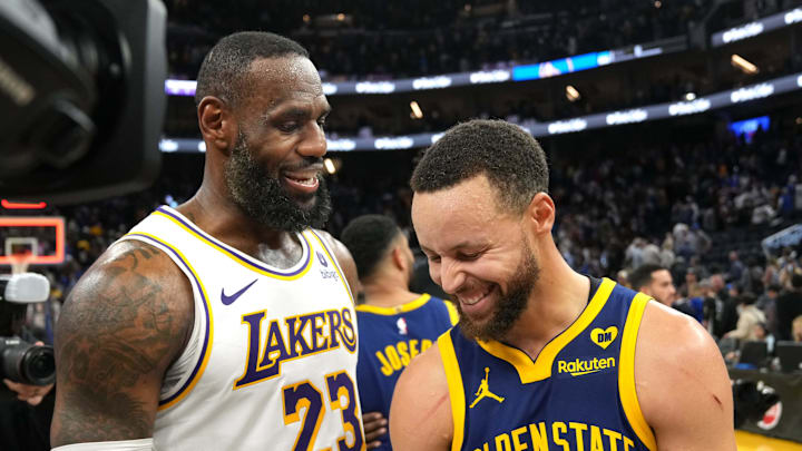 Jan 27, 2024; San Francisco, California, USA; Los Angeles Lakers forward LeBron James (23) and Golden State Warriors guard Stephen Curry (right). Mandatory Credit: Darren Yamashita-Imagn Images