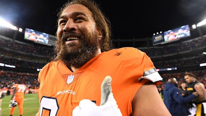 Nov 25, 2018; Denver, CO, USA; Denver Broncos nose tackle Domata Sr. Peko (94) following the win over the Pittsburgh Steelers at Broncos Stadium at Mile High. Mandatory Credit: Ron Chenoy-Imagn Images