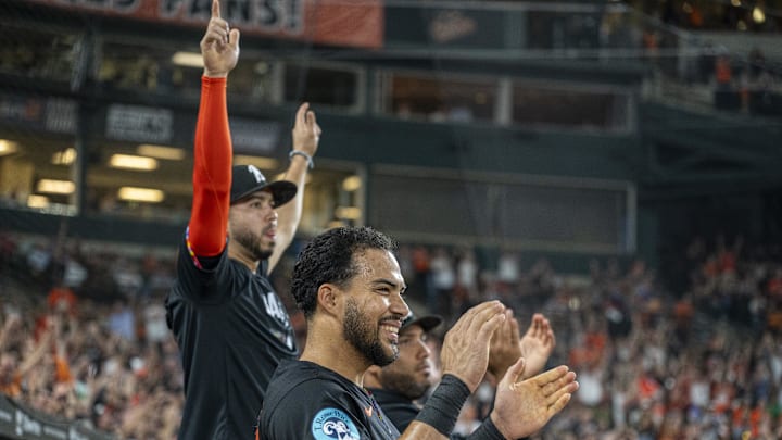 Sep 20, 2024; Baltimore, Maryland, USA;  Baltimore Orioles outfielder Anthony Santander (25) reacts with teammates after outfielder Colton Cowser (not pictured) second inning solo home run against the Detroit Tigers at Oriole Park at Camden Yards. Mandatory Credit: Tommy Gilligan-Imagn Images