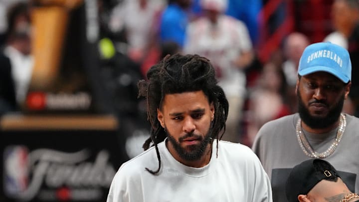 Jun 7, 2023; Miami, Florida, USA; Recording artist J. Cole walks off the court after game three of the 2023 NBA Finals between the Miami Heat and Denver Nuggets at Kaseya Center. Mandatory Credit: Kyle Terada-Imagn Images