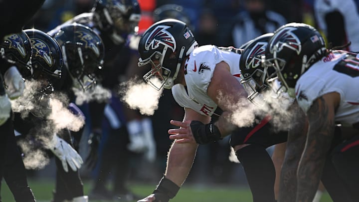 Dec 24, 2022; Baltimore, Maryland, USA;  Atlanta Falcons center Drew Dalman (67) prepares to snap the ball during the first half \G\ at M&T Bank Stadium. Mandatory Credit: Tommy Gilligan-Imagn Images