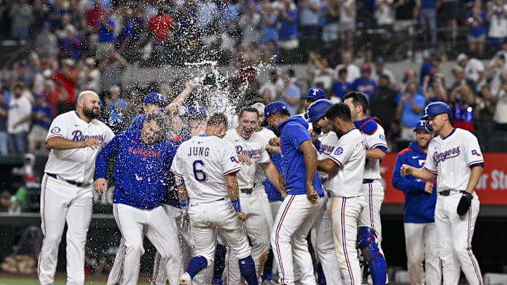 Aug 4, 2025; Arlington, Texas, USA; Texas Rangers designated hitter Josh Jung (6) celebrates with his teammates after he hits a walk-off home run during the game between the Texas Rangers and the New York Yankees at Globe Life Field. Mandatory Credit: Jerome Miron-Imagn Images