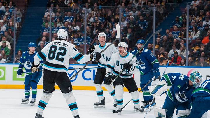 Mar 16, 2025; Vancouver, British Columbia, CAN; Utah Hockey Club forward Kevin Stenlund (82) and defenseman Ian Cole (28) and forward Nick Bjugstad (17) celebrate a goal scored by Stenlund on Vancouver Canucks goalie Kevin Lankinen (32) in the second period at Rogers Arena. Mandatory Credit: Bob Frid-Imagn Images Mar 16, 2025; Vancouver, British Columbia, CAN; Utah Hockey Club forward Kevin Stenlund (82) and defenseman Ian Cole (28) and forward Nick Bjugstad (17) celebrate a goal scored by Stenlund on Vancouver Canucks goalie Kevin Lankinen (32) in the second period at Rogers Arena. Mandatory Credit: Bob Frid-Imagn Images