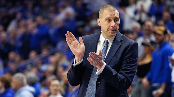 Jan 4, 2025; Lexington, Kentucky, USA; Kentucky Wildcats head coach Mark Pope claps on the sideline before the game against the Florida Gators at Rupp Arena at Central Bank Center. Mandatory Credit: Jordan Prather-Imagn Images