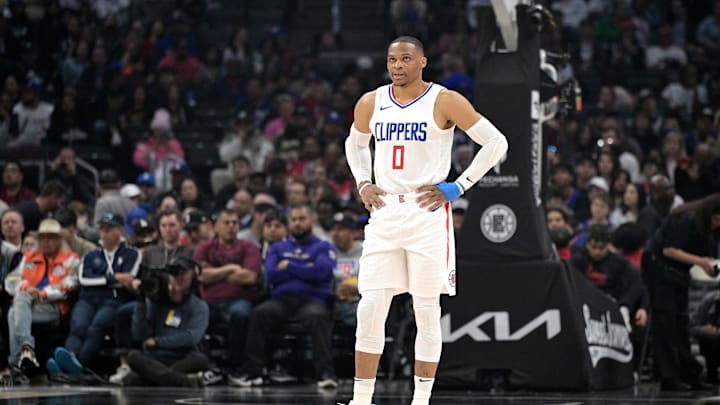 Los Angeles Clippers guard Russell Westbrook (0) looks on in the first half against the Cleveland Cavaliers at Crypto.com Arena. Los Angeles Clippers guard Russell Westbrook (0) looks on in the first half against the Cleveland Cavaliers at Crypto.com Arena.