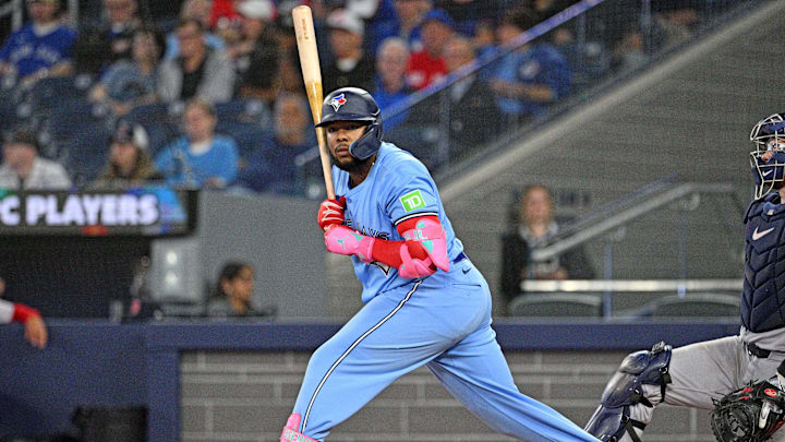 Sep 24, 2024; Toronto, Ontario, CAN; Toronto Blue Jays designated hitter Vladimir Guerrero Jr. (27) looks for a signal from third base coach Mark Budzinski (not shown) in the eighth inning at Rogers Centre. Mandatory Credit: Dan Hamilton-Imagn Images Sep 24, 2024; Toronto, Ontario, CAN; Toronto Blue Jays designated hitter Vladimir Guerrero Jr. (27) looks for a signal from third base coach Mark Budzinski (not shown) in the eighth inning at Rogers Centre. Mandatory Credit: Dan Hamilton-Imagn Images