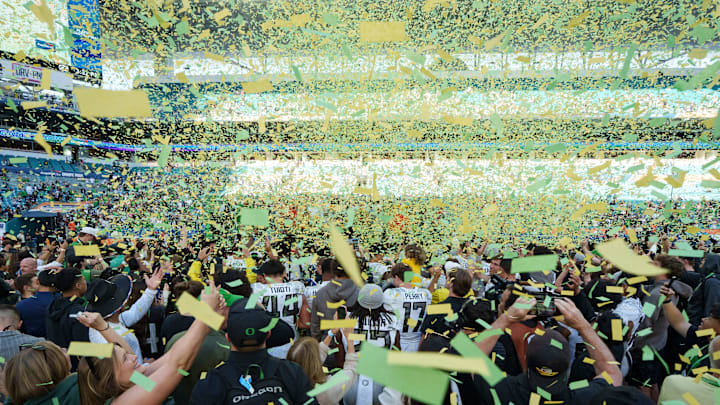 Green and yellow confetti falls as Oregon advanced to the College Football Playoff semifinals.