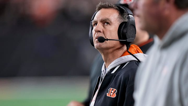 Cincinnati Bengals defensive coordinator Lou Anarumo watches a replay of the Denver Broncos wide receiver Marvin Mims Jr. (19) touchdown on the video board in the fourth quarter of the NFL Week 17 game between the Cincinnati Bengals and the Denver Broncos at Paycor Stadium in downtown Cincinnati on Saturday, Dec. 28, 2024. The Bengals took a 30-24 win in overtime to remain in the post season chase.