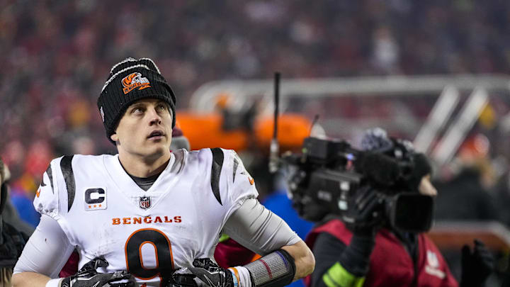 Jan 29, 2023; Kansas City, Missouri, USA; Cincinnati Bengals quarterback Joe Burrow (9) watches the video board as he walks for the locker room after the fourth quarter of the AFC championship NFL game between the Cincinnati Bengals and the Kansas City Chiefs, Sunday, Jan. 29, 2023, at Arrowhead Stadium in Kansas City, Mo. The Kansas City Chiefs advanced to the Super Bowl with a 23-20 win over the Bengals. Mandatory Credit: Sam Greene-Imagn Images