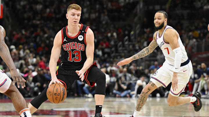 Feb 26, 2025; Chicago, Illinois, USA; Chicago Bulls guard Kevin Huerter (13) moves the ball past LA Clippers guard Amir Coffey (7) during the second half at the United Center. Mandatory Credit: Matt Marton-Imagn Images Feb 26, 2025; Chicago, Illinois, USA; Chicago Bulls guard Kevin Huerter (13) moves the ball past LA Clippers guard Amir Coffey (7) during the second half at the United Center. Mandatory Credit: Matt Marton-Imagn Images