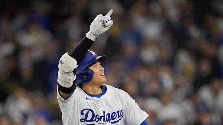 Shohei Ohtani celebrates one of his two home runs against the Athletics on Thursday.