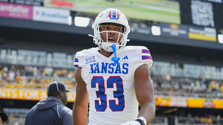Sep 6, 2025; Columbia, Missouri, USA; Kansas Jayhawks defensive end Leroy Harris III (33) reacts during the first half against the Missouri Tigers at Faurot Field at Memorial Stadium. Mandatory Credit: Jay Biggerstaff-Imagn Images