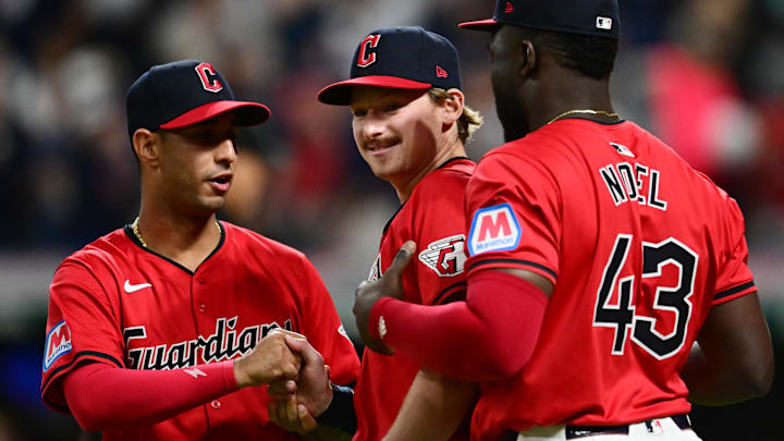 Sep 16, 2024; Cleveland, Ohio, USA; Cleveland Guardians designated hitter Kyle Manzardo, middle, celebrates with shortstop Brayan Rocchio, left and right fielder Jhonkensy Noel (43) after the Guardians beat the Minnesota Twins at Progressive Field. Mandatory Credit: Ken Blaze-Imagn Images