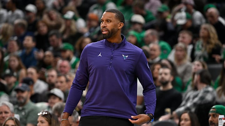 Apr 11, 2025; Boston, Massachusetts, USA; Charlotte Hornets head coach Charles Lee reacts to game action during the first half against the Boston Celtics at TD Garden. Mandatory Credit: Eric Canha-Imagn Images