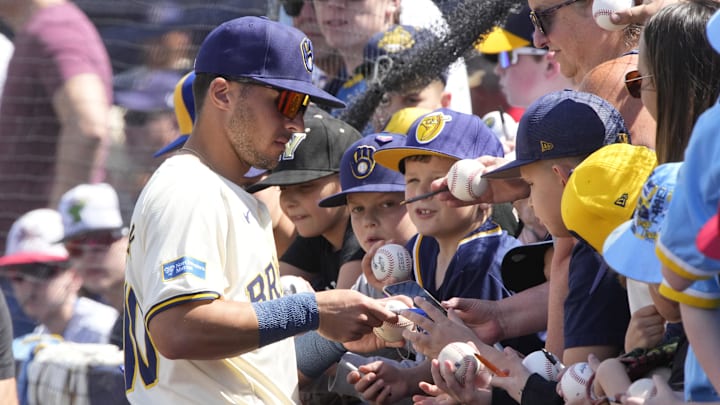 Mar 16, 2024; Phoenix, Arizona, USA; Milwaukee Brewers outfielder Sal Frelick (10) signs autographs