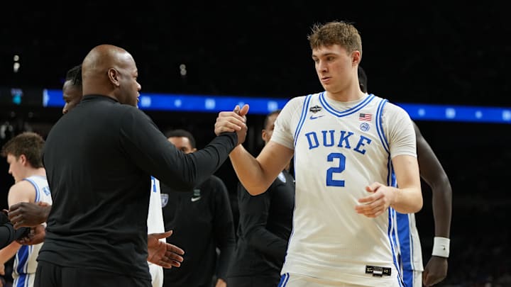 Apr 5, 2025; San Antonio, TX, USA; Duke basketball assistant head coach Will Avery with guard Cooper Flagg (2) before a semifinal of the men's Final Four of the 2025 NCAA Tournament at the Alamodome.