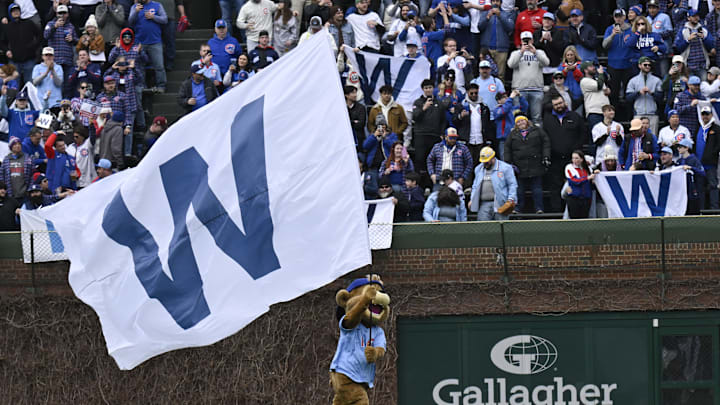Chicago Cubs mascot Clark with the flag after the game against the San Diego Padres at Wrigley Field on April 5. Chicago Cubs mascot Clark with the flag after the game against the San Diego Padres at Wrigley Field on April 5.
