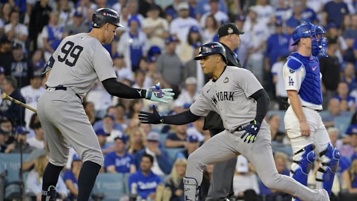 Oct 26, 2024; Los Angeles, California, USA; New York Yankees outfielder Juan Soto (22) celebrates with outfielder Aaron Judge (99) after hitting a solo home run in the third inning against the Los Angeles Dodgers during game two of the 2024 MLB World Series at Dodger Stadium. Mandatory Credit: Jayne Kamin-Oncea-Imagn Images Oct 26, 2024; Los Angeles, California, USA; New York Yankees outfielder Juan Soto (22) celebrates with outfielder Aaron Judge (99) after hitting a solo home run in the third inning against the Los Angeles Dodgers during game two of the 2024 MLB World Series at Dodger Stadium. Mandatory Credit: Jayne Kamin-Oncea-Imagn Images